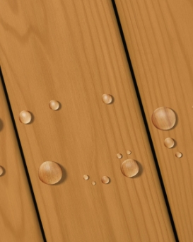 Deck boards with water beading with moderate stain color and visible wood grain. 