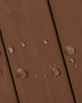 Deck boards with water beading and rich color that obscures most wood grain.