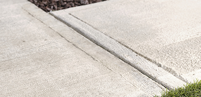 Concrete sidewalk with typical expansion joint.