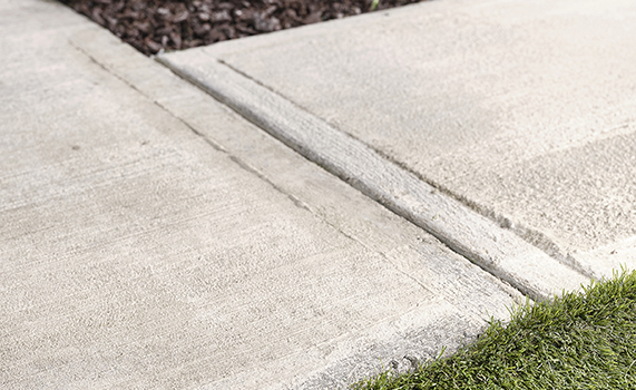 Close-up view of concrete walkway. 